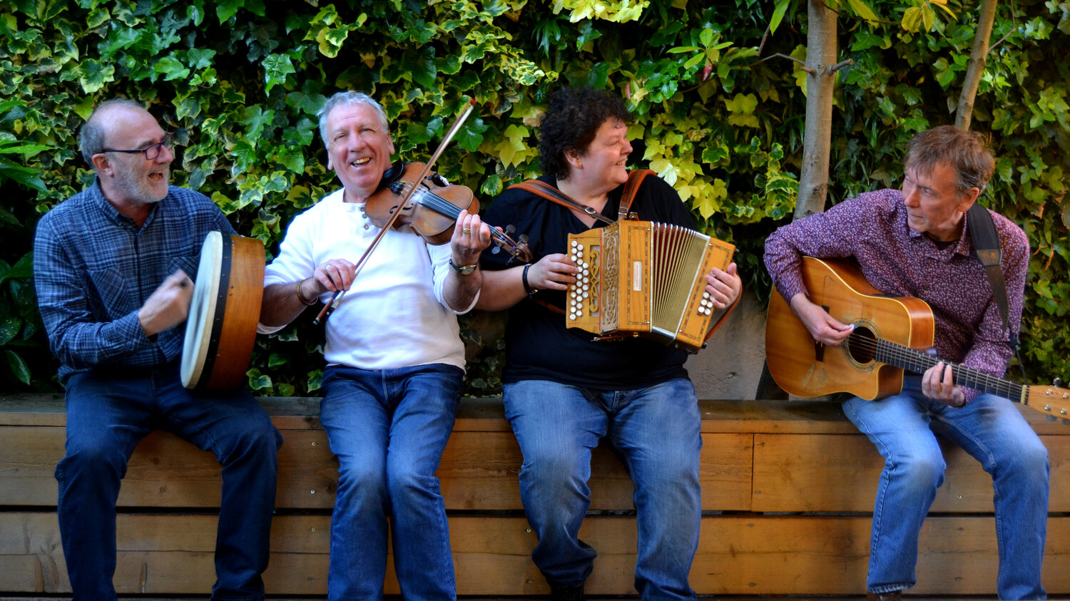 Photograph of Kellys Heroes band members with their instruments